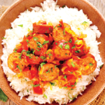 Creole,Dish-,Rougail-,Sausage,With,Spicy,Tomato,Sauce,And,Rice