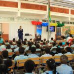 CEO Veemal Gungadin during speech