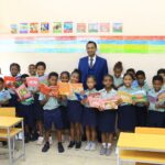 CEO Veemal Gungadin with pupils (2)