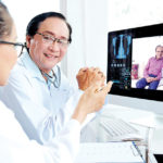 Medical workers having video conference