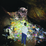 Rubbish dumping in plaine des roches inside cave