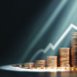 financial-growth-concept-with-ascending-coin-stacks-upward-arrow