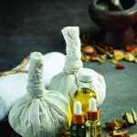 Herbal compress and herbal spa treatment equipments put on dark
